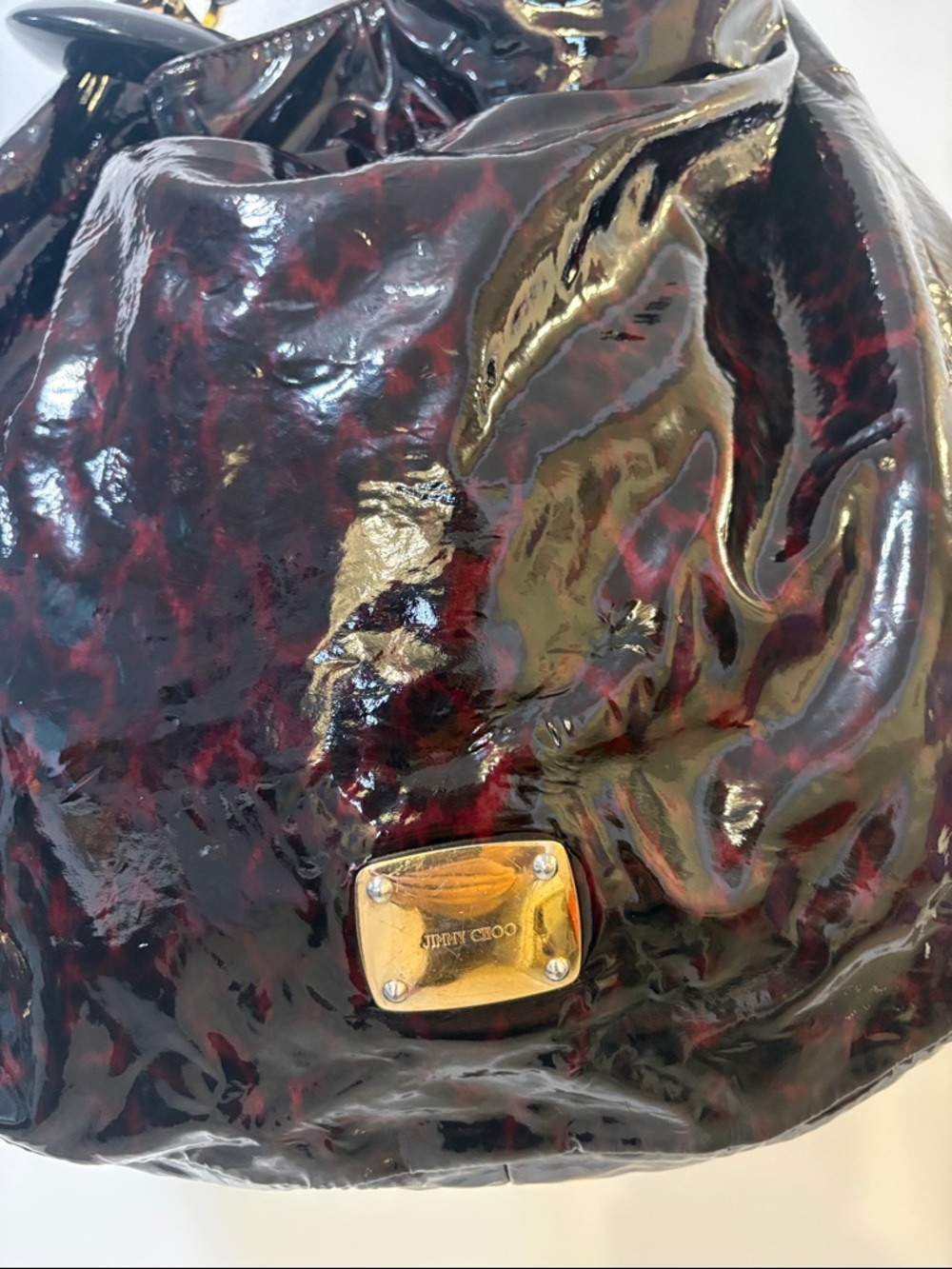 Jimmy Choo Black and Burgundy Patent Hobo with Gold Plaque